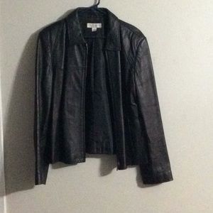Soft black leather jacket. 23 1/2” long. Size. Lg